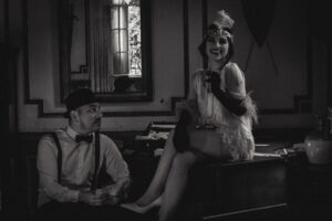 Woman and man in 1920s outfits
