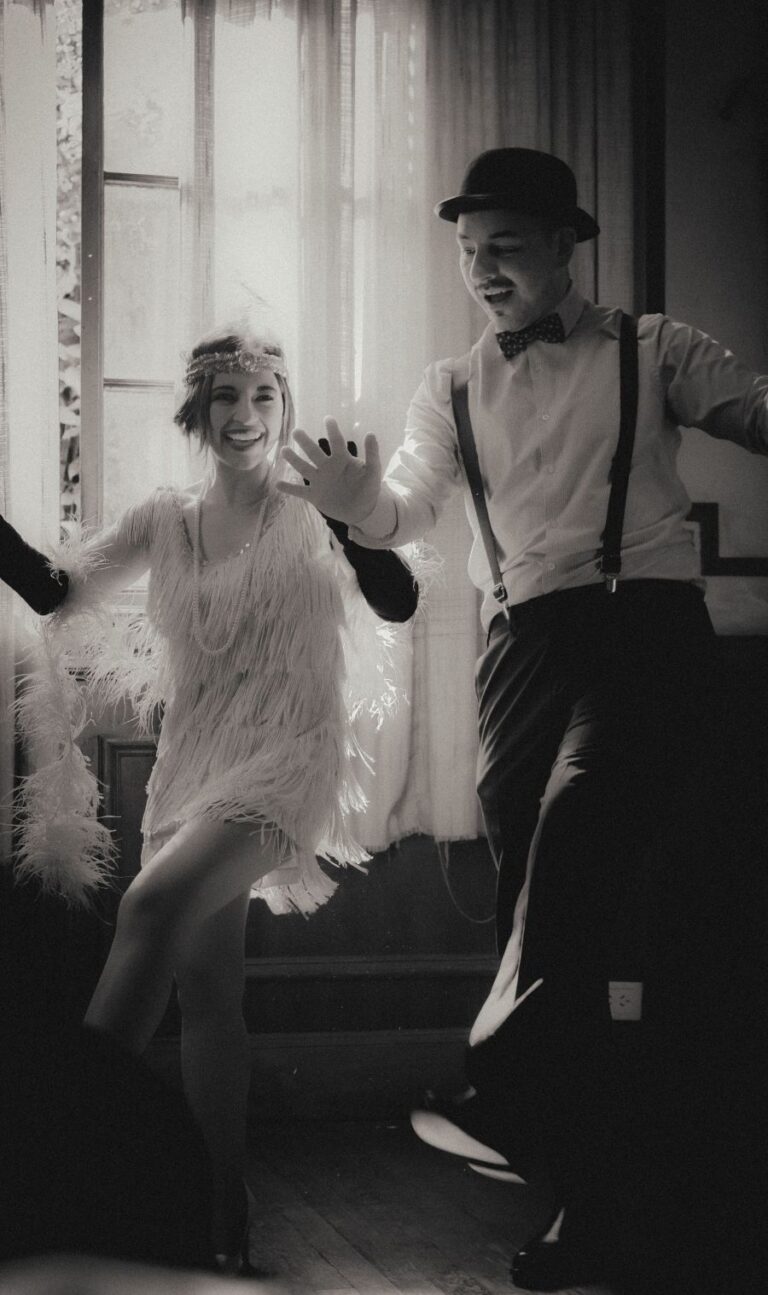 Couple in 1920s dress, dancing