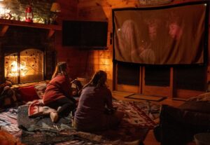 Watching a movie with blankets and an open fire