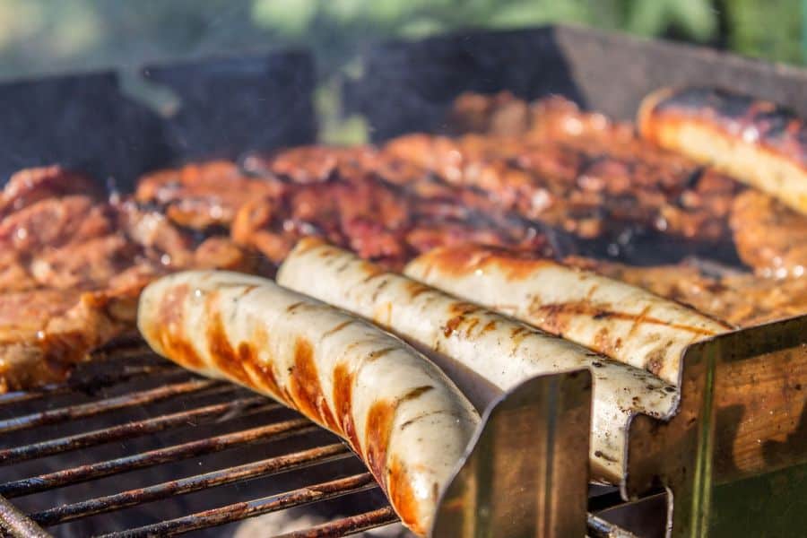 Meats cooking on a BBQ