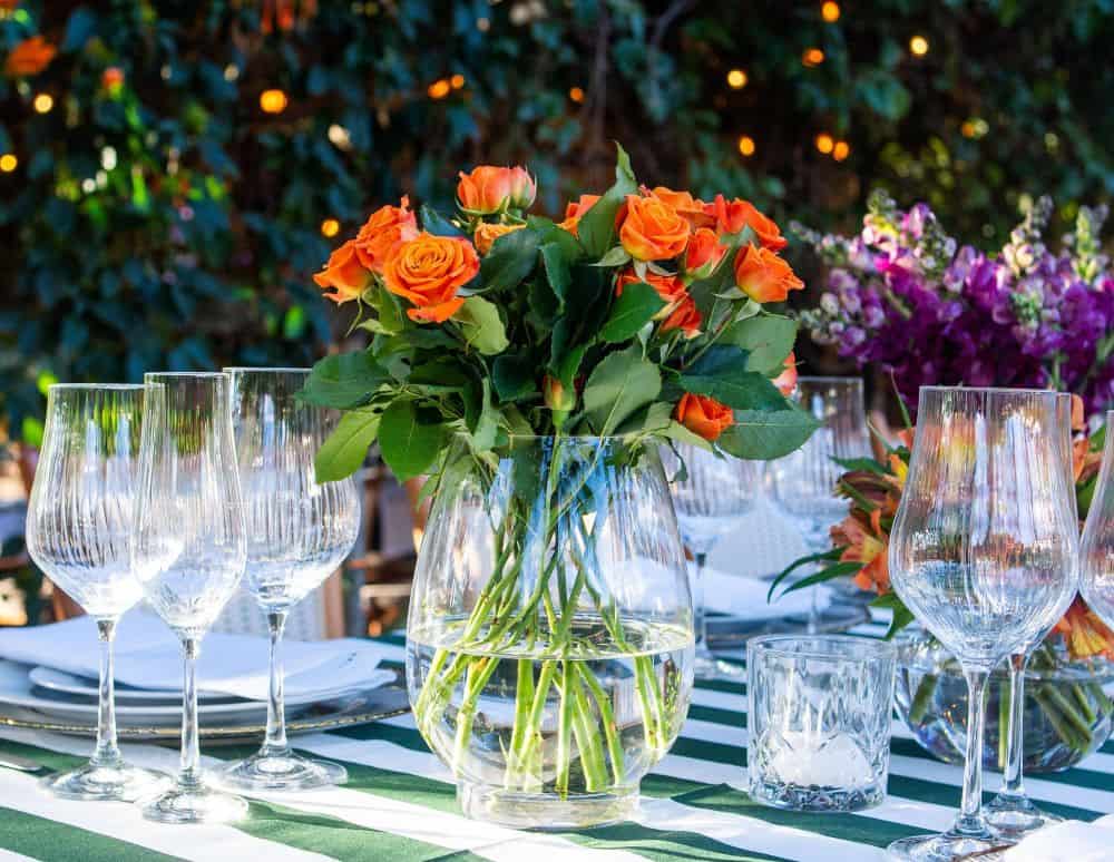 Garden party table with orange and purple flowers