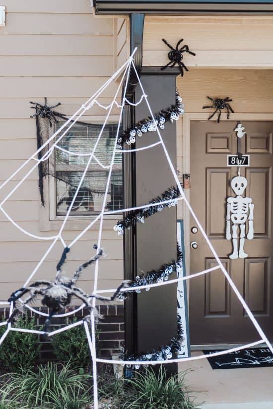 Classic Halloween doorway with spiders, webs and skeletons