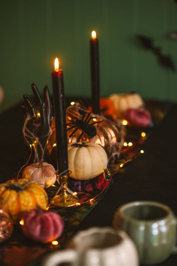 Halloween table with pumpkins and candles