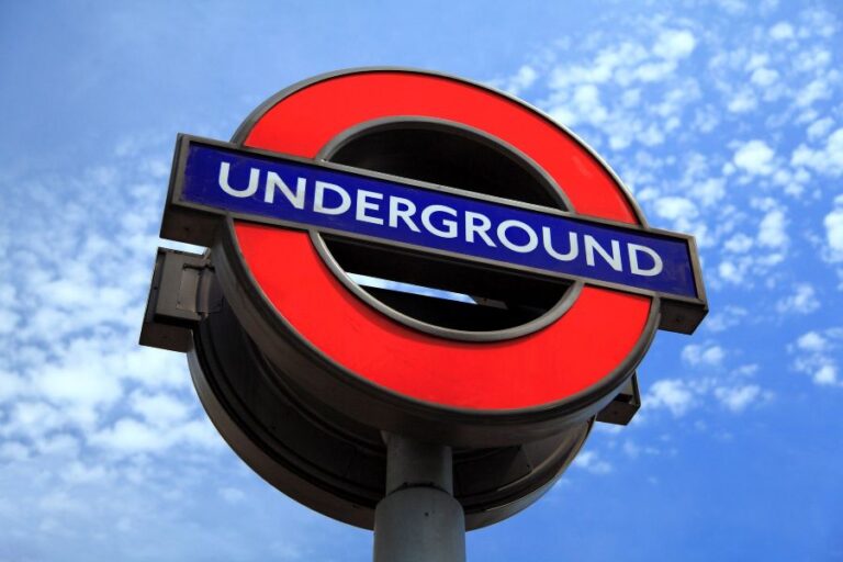 London Underground sign against a blue sky